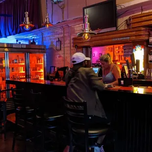 a man sitting at a bar