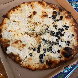 Large Bianca with half black olives