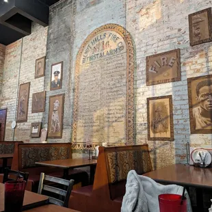 Wall decor, old fire house station turned pizza place.