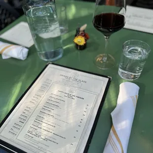 Happy hour menu and outdoor table.