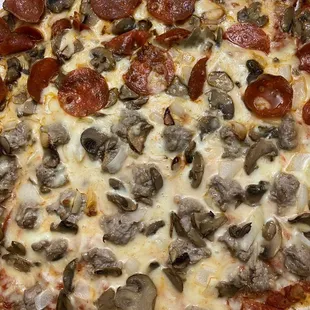 a pepperoni and mushroom pizza