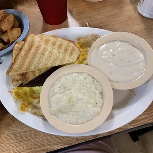 hungry man meal grits, gravy, liver mush, egg cooked over hard, toast