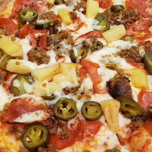 Pepperoni,  pineapple, and jalapeno special with added sausage.