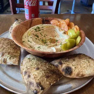 Hummus with pickled veggies and pita