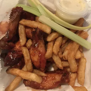 An order of wings comes with fries