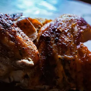 Wood-fired Rotisserie Chicken. Seasoned and fired everyday. Available after 4 p.m.