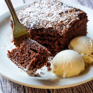 Cola Cake- chocolate cake with pepsi-cola in the batter and served with vanilla ice cream. You have to finish your dinner with this treat.