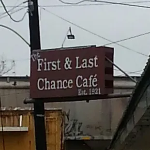 sign for first and last chance cafe