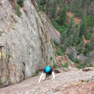 First Ascent climber on Crack Parallel 5.7 in North Cheyenne Cañon