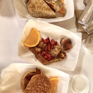 Breakfast Wrap ($6), Half Stack Fluffy French Toast ($5.50), Breakfast Sandwich with Bacon ($8)