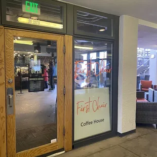 the entrance to a coffee house