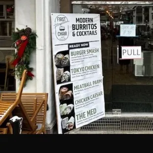 Sandwich board out front