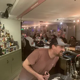 a man sitting at a bar