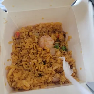 shrimp fried rice in a takeout box