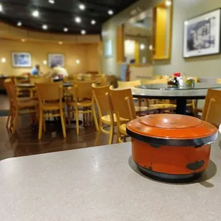 a pan on a table in a restaurant