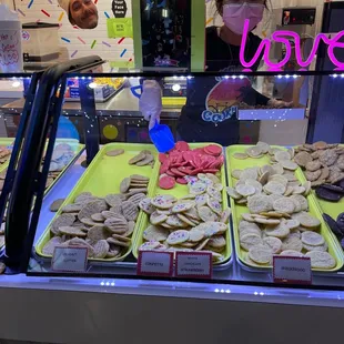a display of cookies and pastries