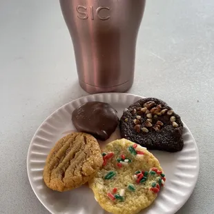 I am sitting outside enjoying treats, water and the beautiful weather.