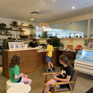 children sitting in chairs