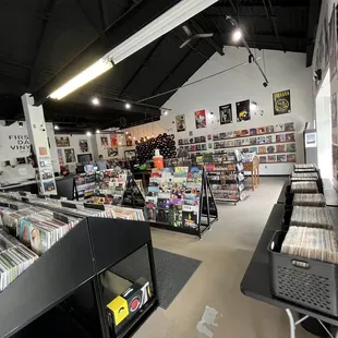 A lot of Vinyls, posters, cassettes, CD's, vinyl cleaners and covers, and puzzles.