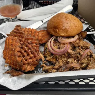 Pulled pork sandwich with sweet pastor fries