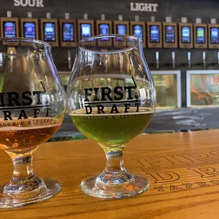 Cherry Glider Cider (left) &amp; Blue Raspberry Sour IPA (right)