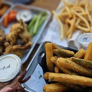 Regular Fries, Zuchinni Fries, and 12 Wings: 6 Buffalo and 6 Garlic Butter, comes with carrots, celery, and ranch.