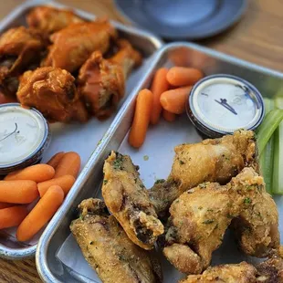 12 Wings: 6 Buffalo and 6 Garlic Butter, comes with carrots, celery, and ranch.