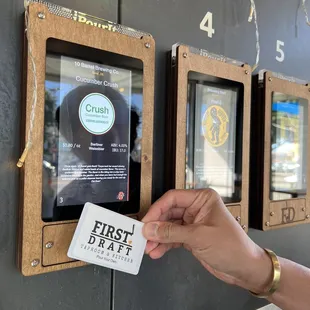 a hand holding a ticket