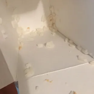 White rice carton, those beige clumps were in there after taking out the rice and they were also mixed in.