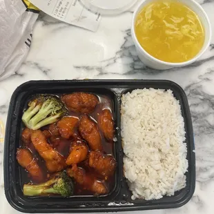 Orange Chicken Lunch with white rice and cup of egg drop soup $10.50