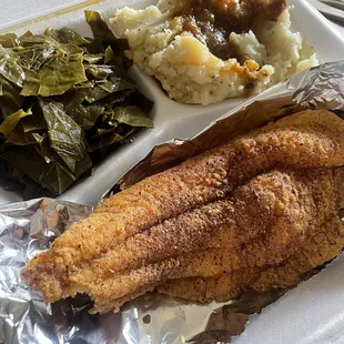 Fried catfish with collard greens and mashed potatoes with gravy