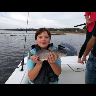 my grandson and the fish he caught with @firstlandingcharters
