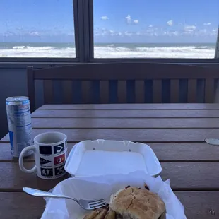 Breakfast sandwich biscuit and potatoes