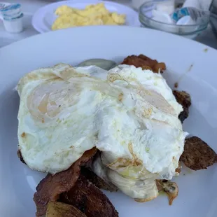 a plate of breakfast food on a table