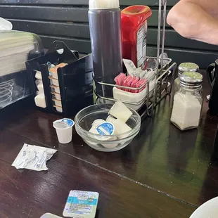 Table goods: cream, butter, jam, napkins, etc