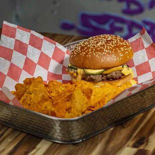 a burger and chips in a basket