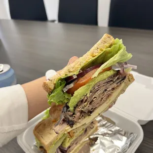 Huge portion Roast beef, avocado, Swiss cheese on rye