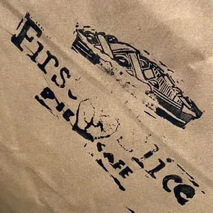 a paper bag with a picture of a car on it
