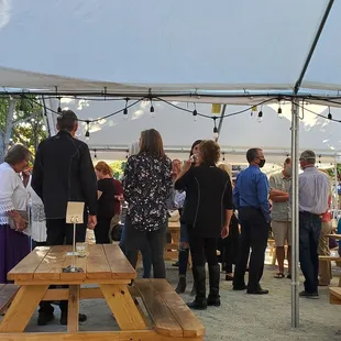 a group of people under a tent