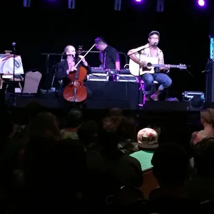 a group of musicians on stage