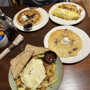 Chickichanga, hash, and blueberry and chocolate chip pancake