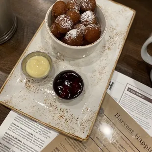 Seasonal menu pumpkin spice donuts with 2 dips