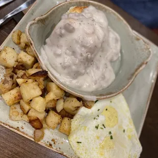 Biscuit and turkey gravy with eggs and potatoes