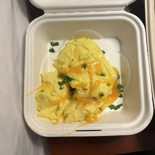 Eggs scrambled softly with cheese