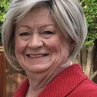 Ann E.