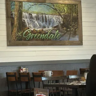 old timey Greendale poster out of place with sleek decor