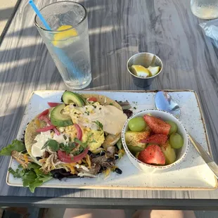 Carnitas Breakfast Tostad, water w/lemon