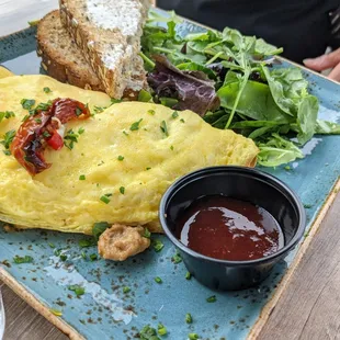 My friend had the Italian Omelette, which looked fantastic. However, I was mesmerized by the (buttered!) multi-grain toast with jam. Yum.