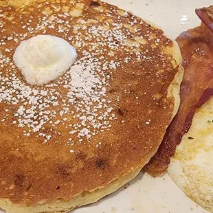 Cinnamon Chip Pancake breakfast includes two eggs your way, &amp; meat choice. Two strips of yummy bacon.