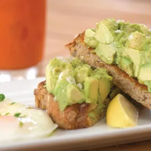 avocado toast and eggs on a plate